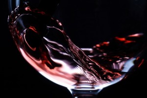 closeup of red wine pouring