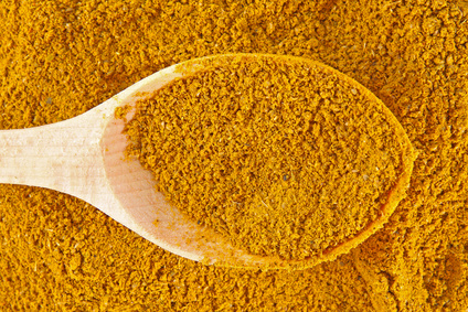 Curry spice with wooden spoon Poulet rôti à la crème de curry accord recette vin iDealwine